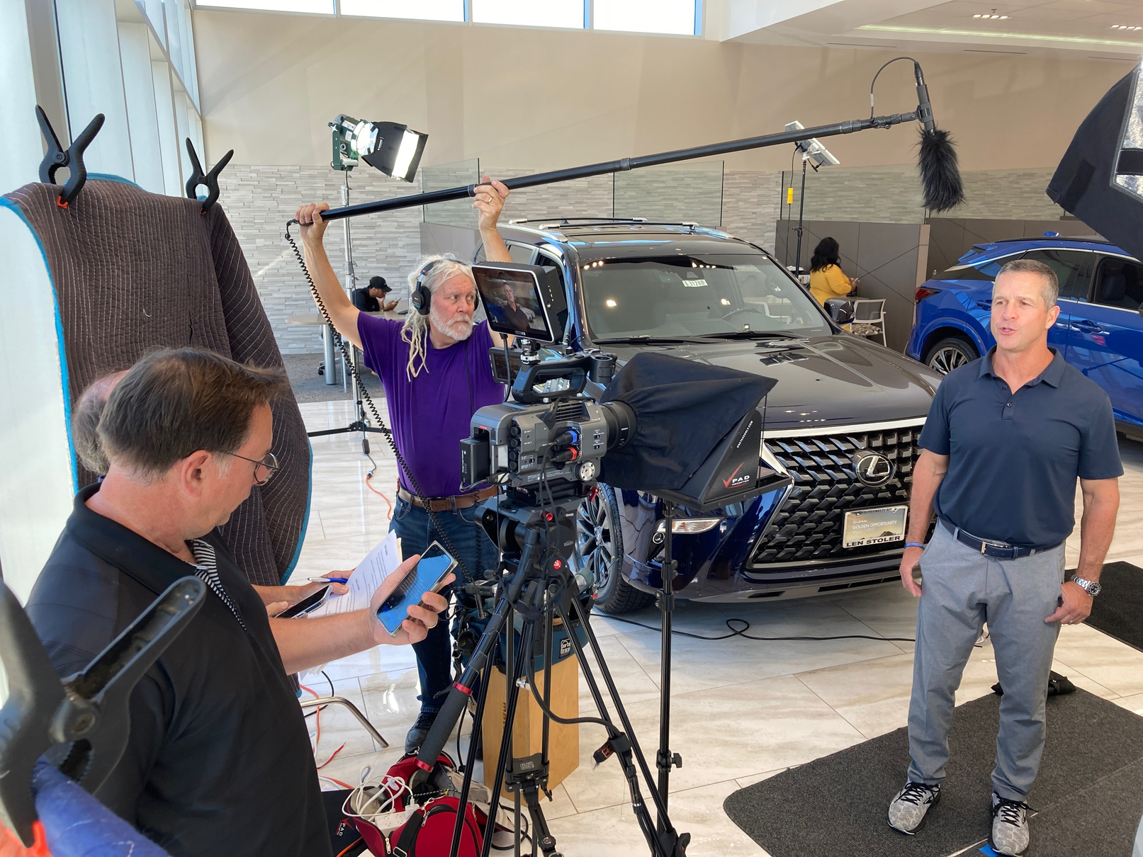 The Maryland Motion Pictures video production team shooting  on location in Owings Mills working with Baltimore Raven's Head Coach John Harbaugh.